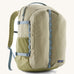 Patagonia refugio 32L daypack in light green and blue trim. Shows mesh side pockets and zipped compartment. 
