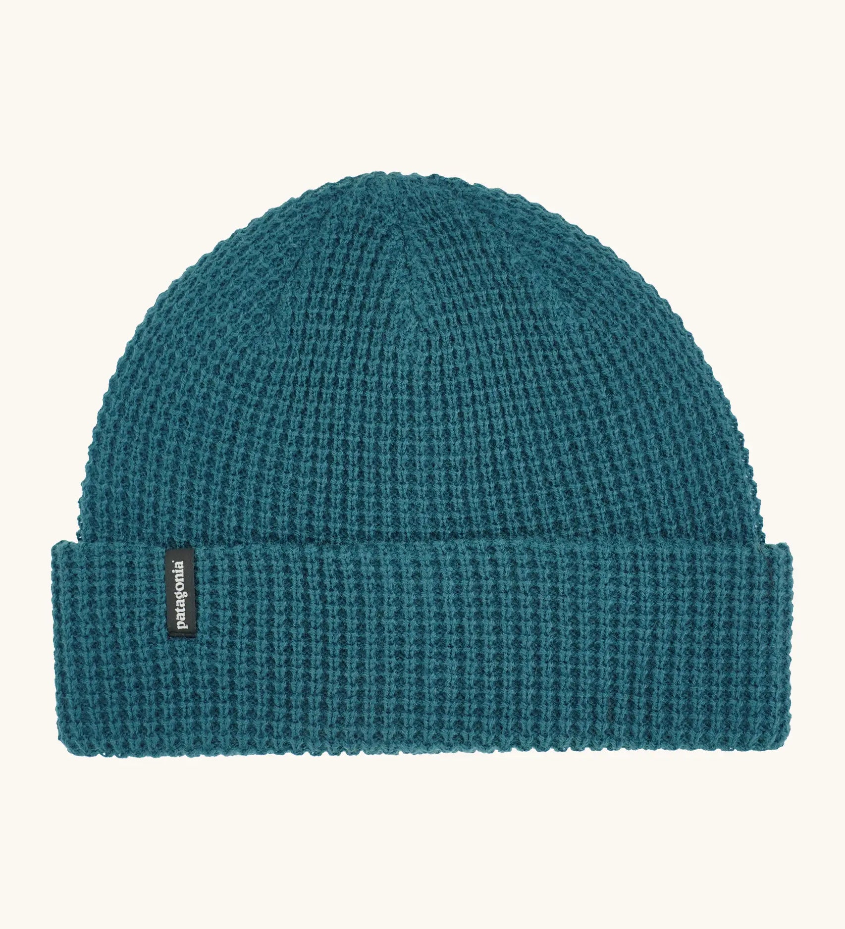 Patagonia unisex adult snowdrifter beanie in glacial blue. A waffle knit style hat with a turn up brim