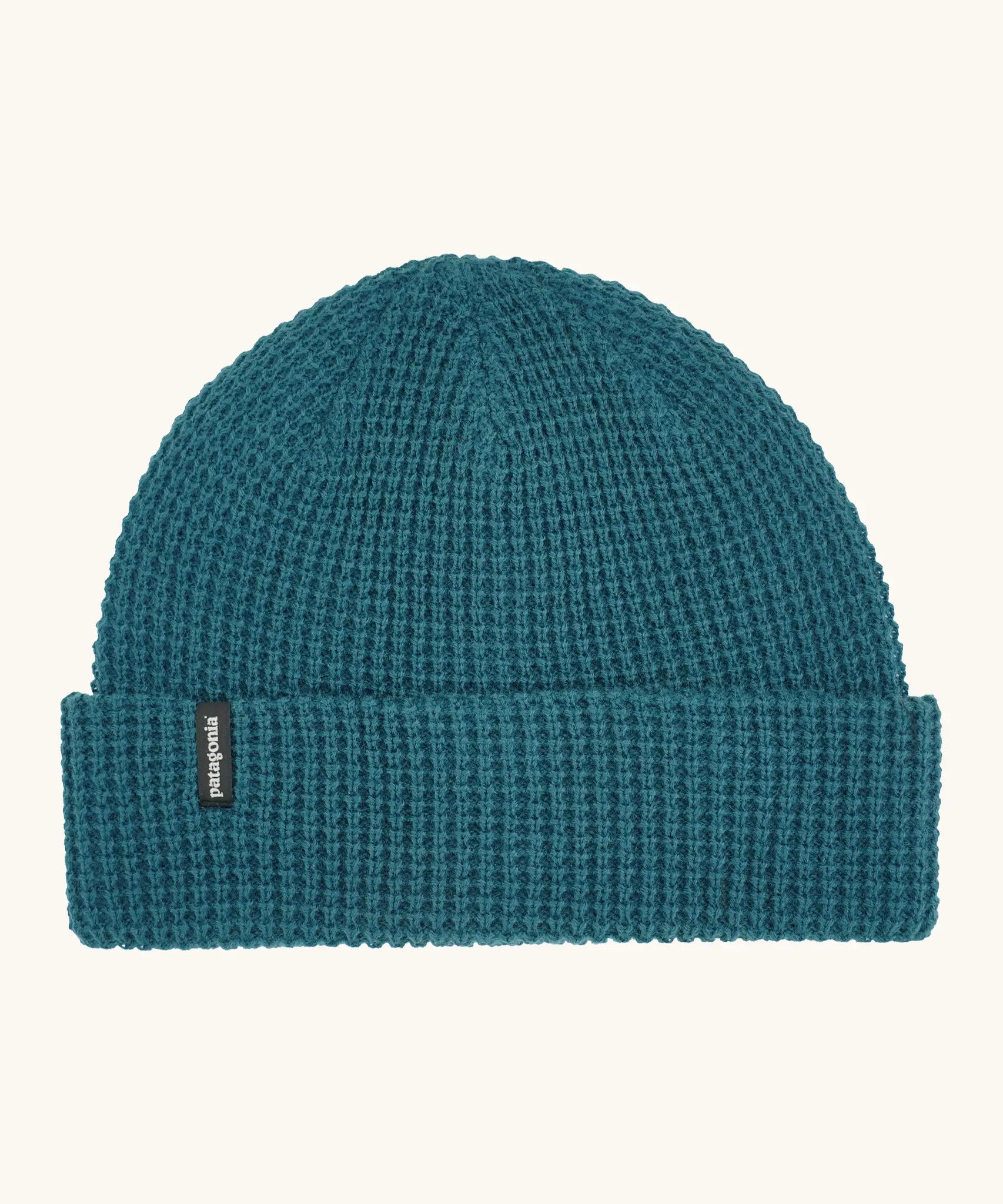 Patagonia unisex adult snowdrifter beanie in glacial blue. A waffle knit style hat with a turn up brim