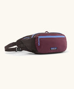 Patagonia terravia hip bag in dark purple with lilac trim. Features 2 zipped compartments and small mesh side pocket