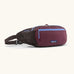 Patagonia terravia hip bag in dark purple with lilac trim. Features 2 zipped compartments and small mesh side pocket
