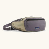 Patagonia terravia hip bag in may grey. Features 2 zipped compartments and small green mesh side pocket