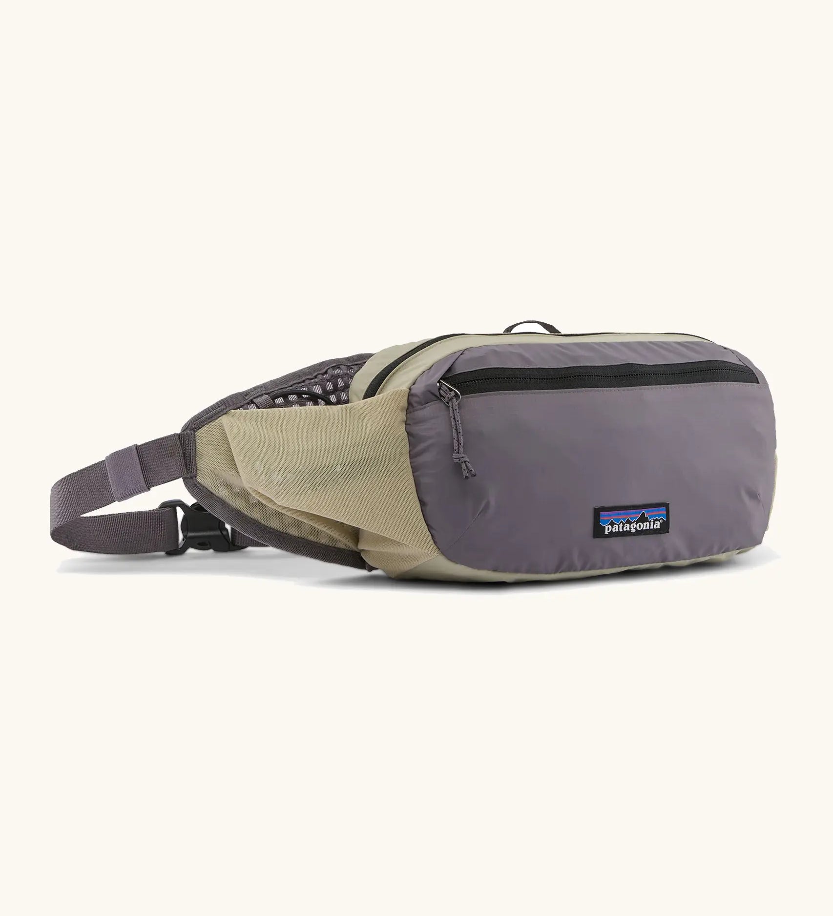 Patagonia terravia hip bag in may grey. Features 2 zipped compartments and small green mesh side pocket