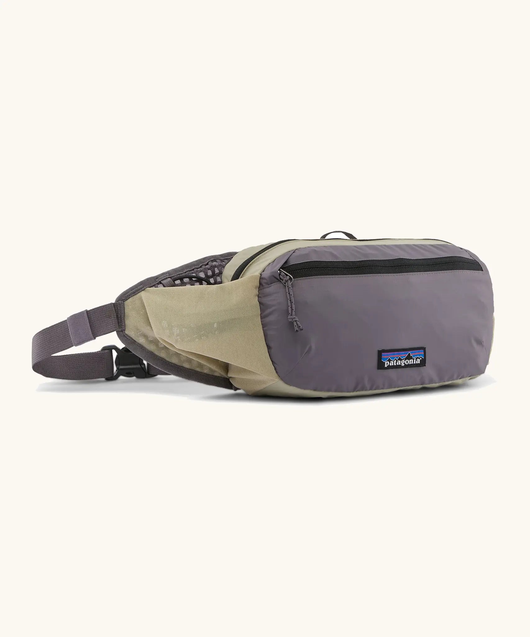 Patagonia terravia hip bag in may grey. Features 2 zipped compartments and small green mesh side pocket
