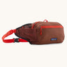Patagonia terravia 5 litre hip pack. A 100% recycled material hip pack in deep red with bright red detail. Features 2 main compartments, mesh side pockets and a buckle fastener