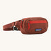 Patagonia terravia mini bum bag in dried vanilla available at Babipur. A 100%  recycled material pack in dark red with bright red detail. Features 2 main zipped compartments and a buckle fastener 