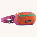 Patagonia weather repellent terravia mini hip pack in pink with orange front . Shows 2 zipped front pockets