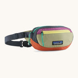 Patagonia weather repellent recycled nylon terravia mini hip pack in navy with green front Shows 2 zipped front pockets
