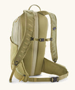 Patagonia terravia 22L backpack in light green with chest and waist straps with black quick release buckles.