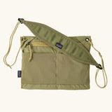 Patagonia quick-drying terravia sacoche in green. A lightweight small over the shoulder bag with drop in pockets and main zipped compartment