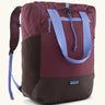 Patagonia water repellent Terravia tote bag in berry with lilac trim. Features a front zip pocket, carry handle, side pockets and shoulder straps 