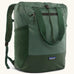 Patagonia water repellent Terravia tote bag in green. Features a front zip pocket, carry handle, side pockets and shoulder straps 