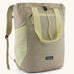 Patagonia water repellent Terravia tote bag in beige with light yellow trim. Features a front zip pocket, carry handle, side pockets and shoulder straps 