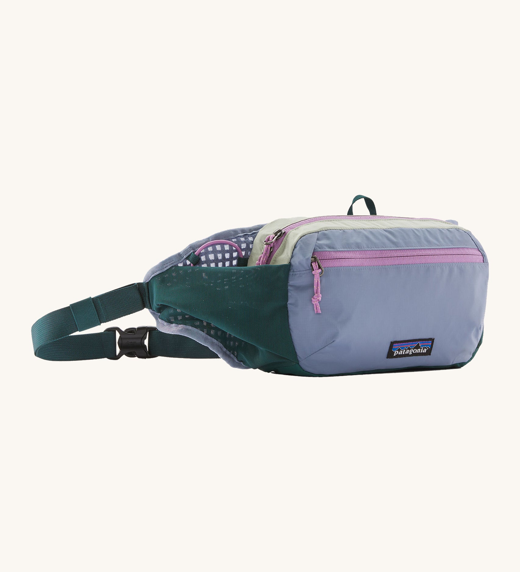 Patagonia terravia 5 litre hip pack. A 100% recycled material hip pack in pastel blue with dark green and pink detail. Features 2 main compartments, mesh side pockets and a buckle fastener