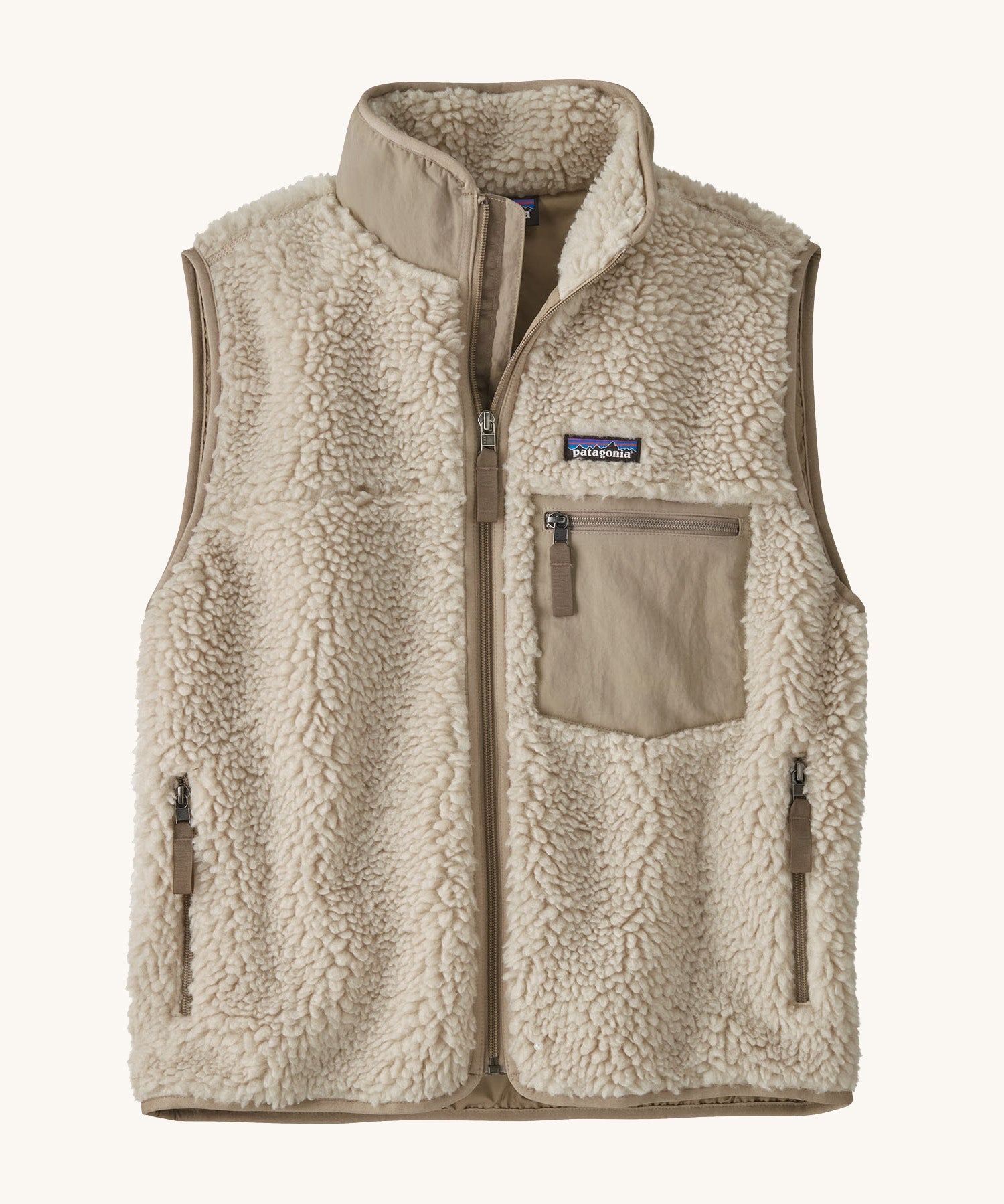 Patagonia thick fleece gilet. In cream with dark cream trim. Features a turned up collar with a zip from the neckline down with a cream patch pocket and side pockets