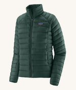 Patagonia puffer style jacket in dark green. Features a full length zip and side pockets.