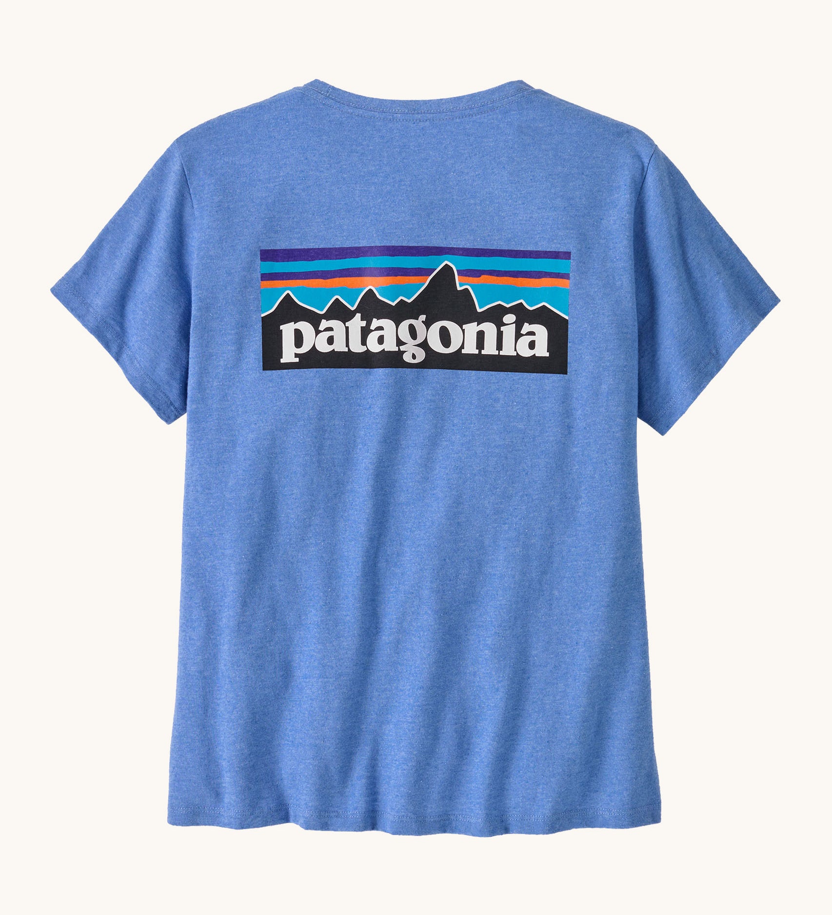Back of Patagonia organic cotton short sleeve t-shirt in light blue with big brand patch on the top