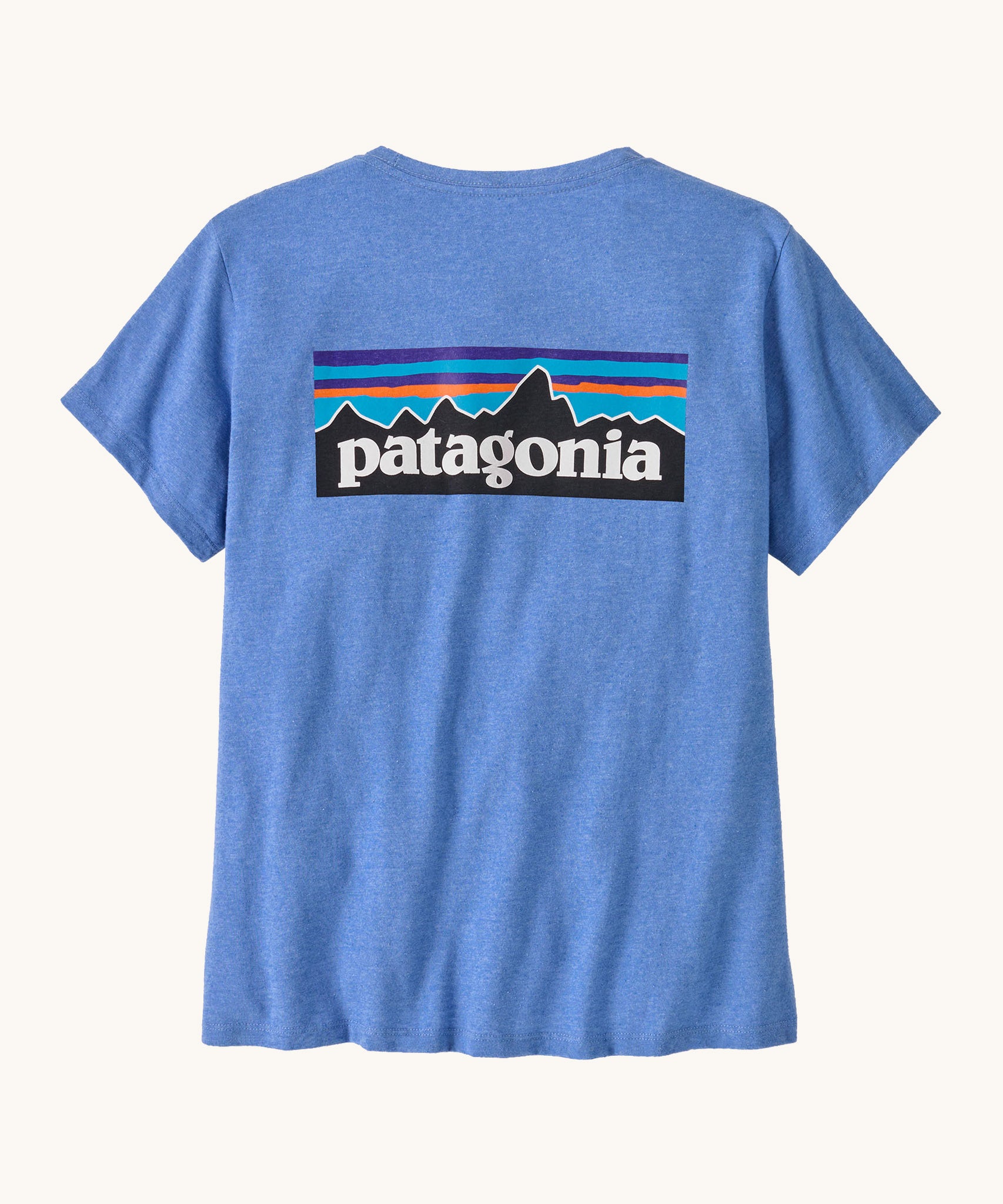 Back of Patagonia organic cotton short sleeve t-shirt in light blue with big brand patch on the top