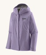 Patagonia hooded rain coat in pastel purple colour with a grey inner lining. Features a full length front zip and side pockets.