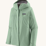 Patagonia hooded rain coat in pastel green colour with a grey inner lining. Features a full length front zip and side pockets.