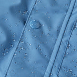 Water droplets on the fromt of the Patagonia Baby Snow Pile Bibs, showing how waterproof the Bibs are