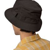 The back of man wearing Patagonia's 100% recycled nylon water repellent adult bucket hat in black. Shows 2 air holes on the side