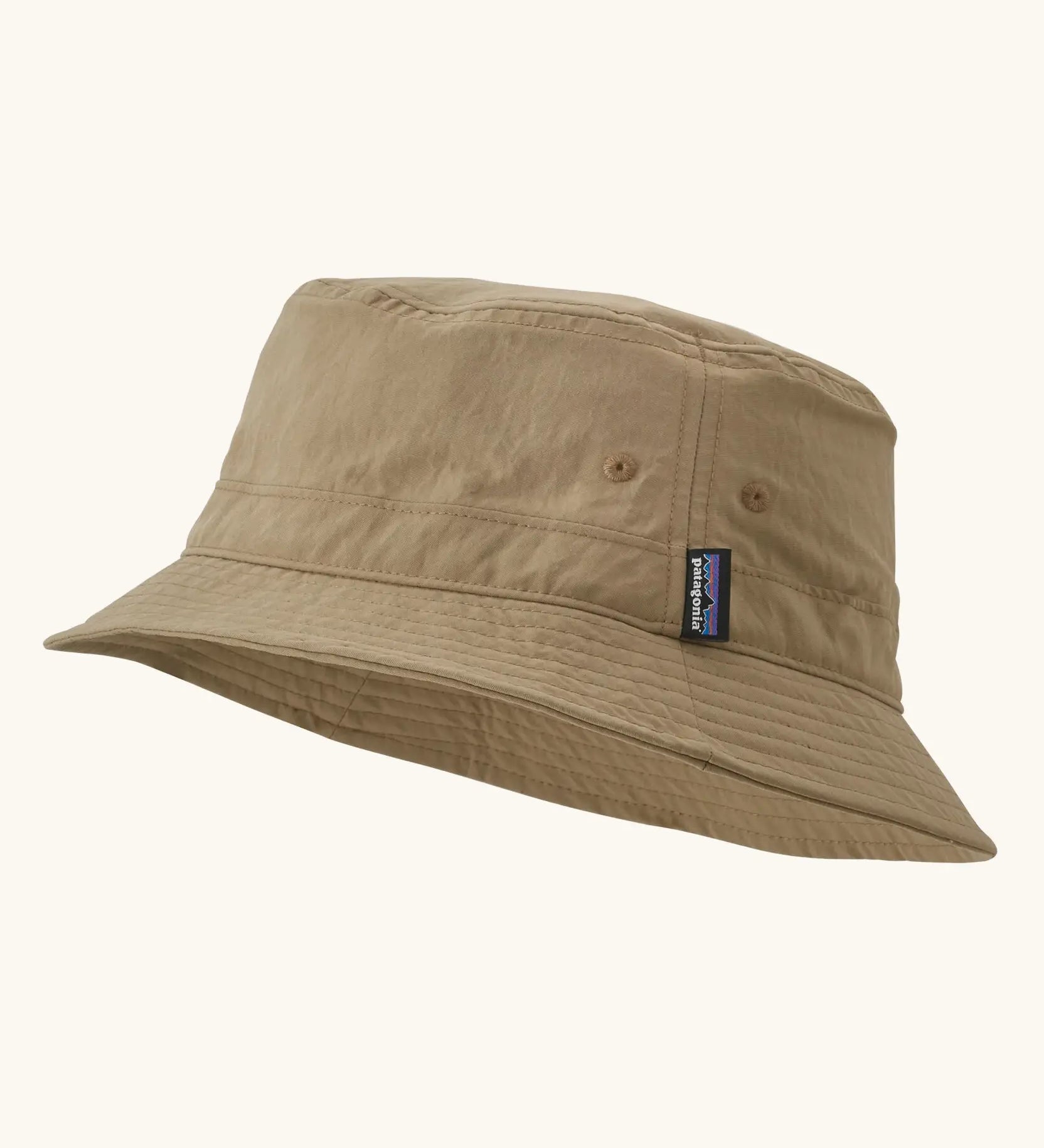 Patagonia breathable quick drying wavefarer bucket hat in khaki green with air holes on the side
