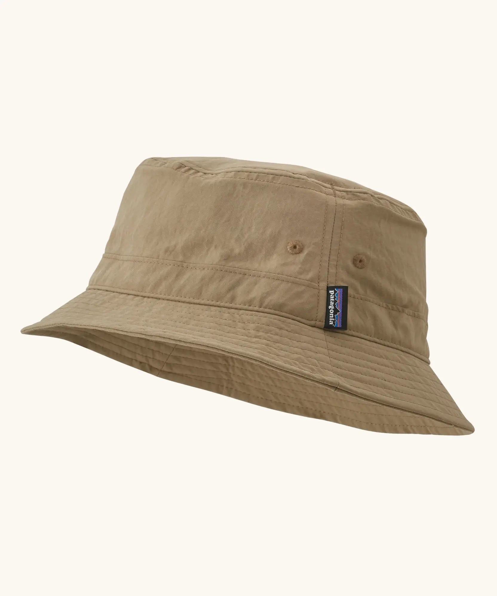 Patagonia breathable quick drying wavefarer bucket hat in khaki green with air holes on the side