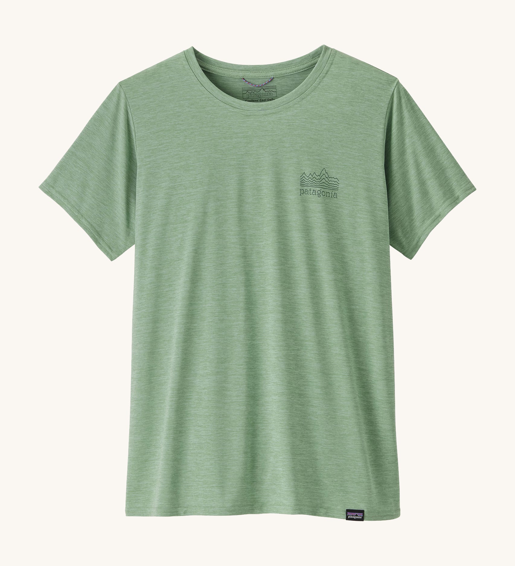 The front of the Patagonia Women's Capilene Cool Daily Graphic Shirt - Strataspire / Ellwood Green X-Dye available at Babipur. A pale green top with short sleeves and a brand name graphic on the chest.
