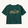 Patagonia women's unity Fitz roy responsibili tshirt. A green, short sleeved and boxy top with the brand logo printed on the front. 