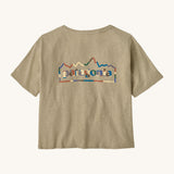 Patagonia women's unity Fitz roy responsibili tshirt. A light brown, short sleeved and boxy top with the brand logo printed on the front. 