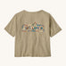 Patagonia women's unity Fitz roy responsibili tshirt. A light brown, short sleeved and boxy top with the brand logo printed on the front. 