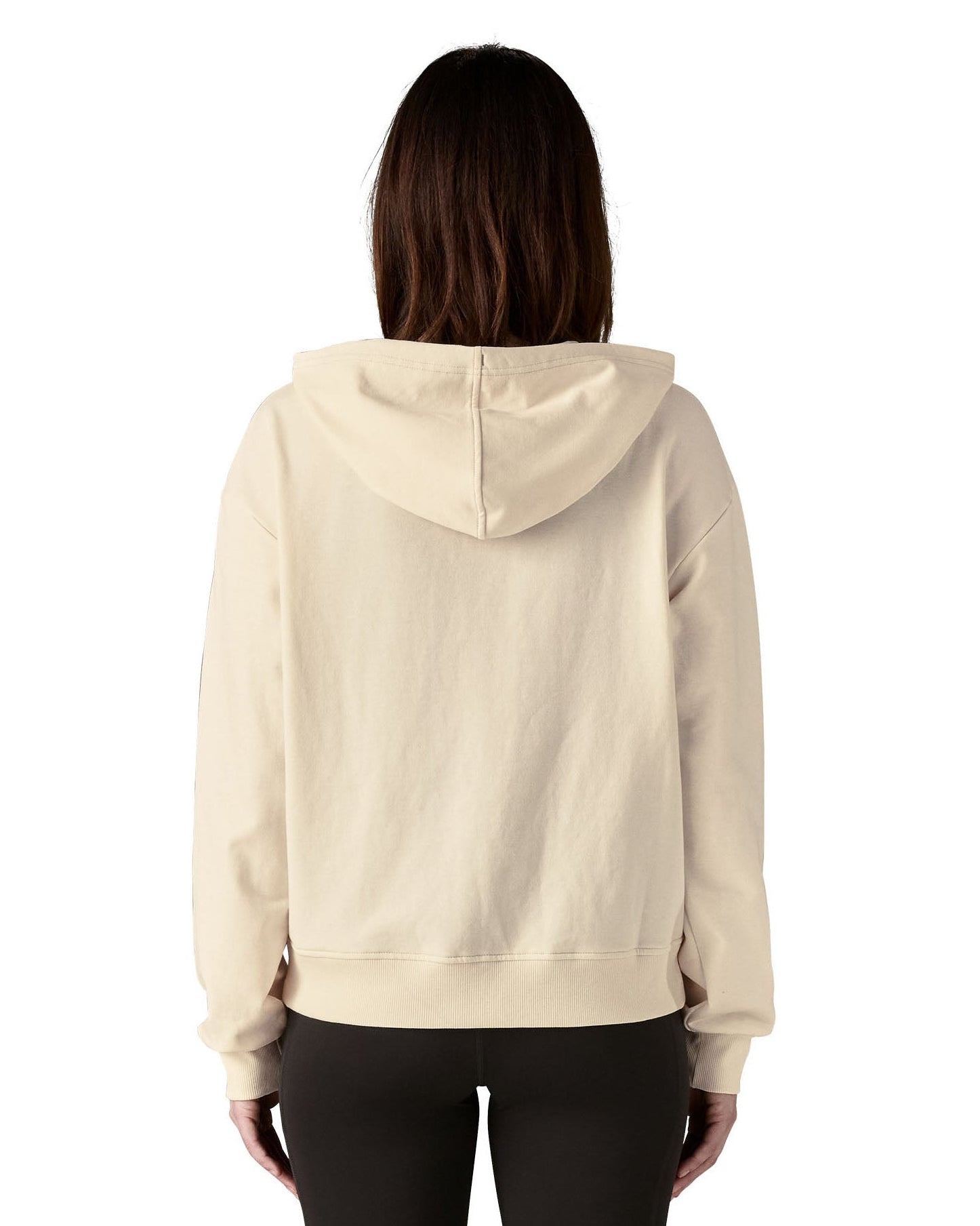 Back of woman wearing Patagonia's women's Anhya hoody with the hood down