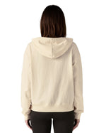 Back of woman wearing Patagonia's women's Anhya hoody with the hood down