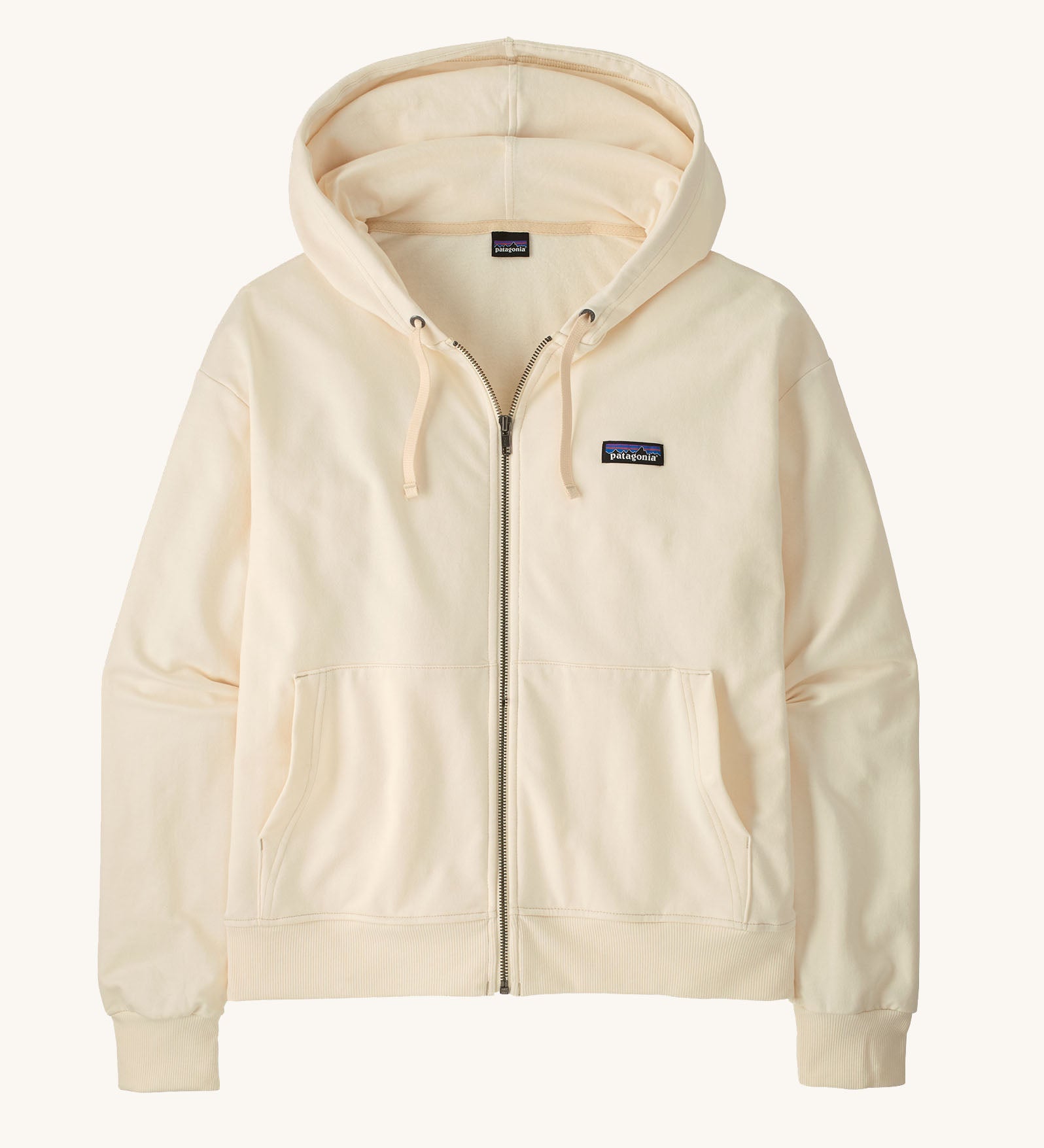 Patagonia women's Anhya hoody in cream. Shows a full length front zip and pouch pockets 