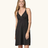 Front of woman wearing Patagonia's amber dawn organic cotton sleeveless dress in black.