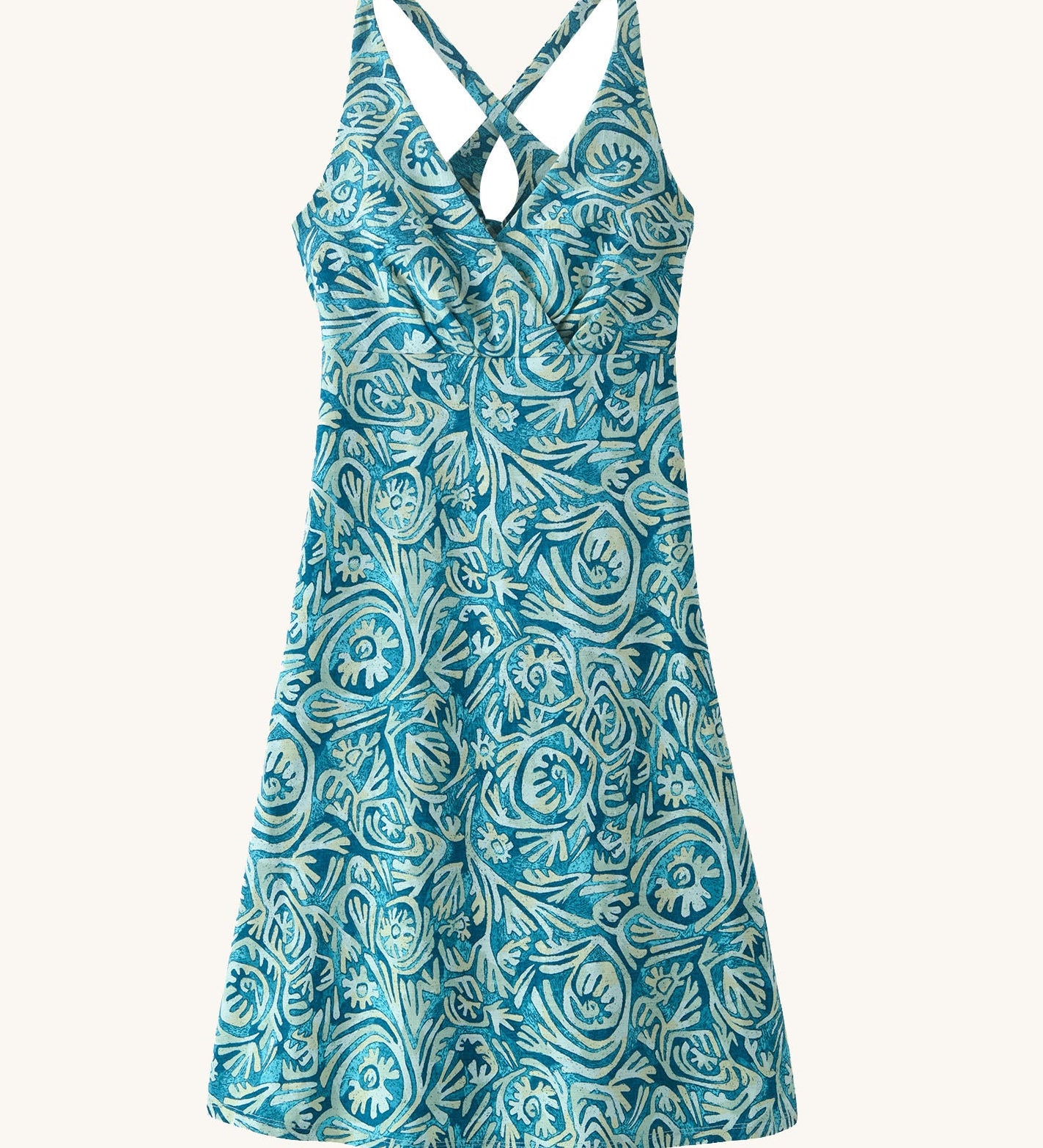 Patagonia women's amber dawn organic cotton dress in blue with repeating abstract design. Shows front low v neck  