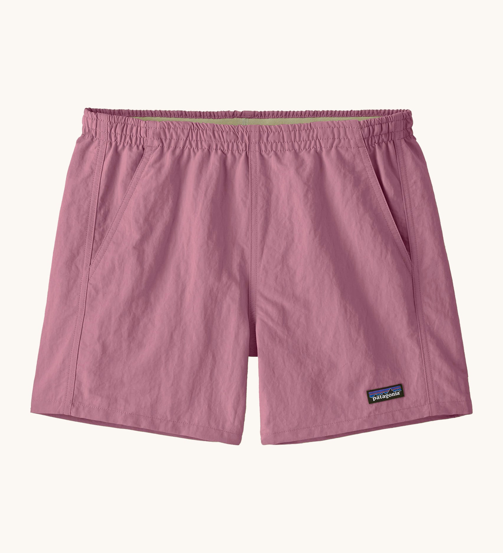 Patagonia quick drying women's baggies shorts in light purple. Shows 2 front pockets