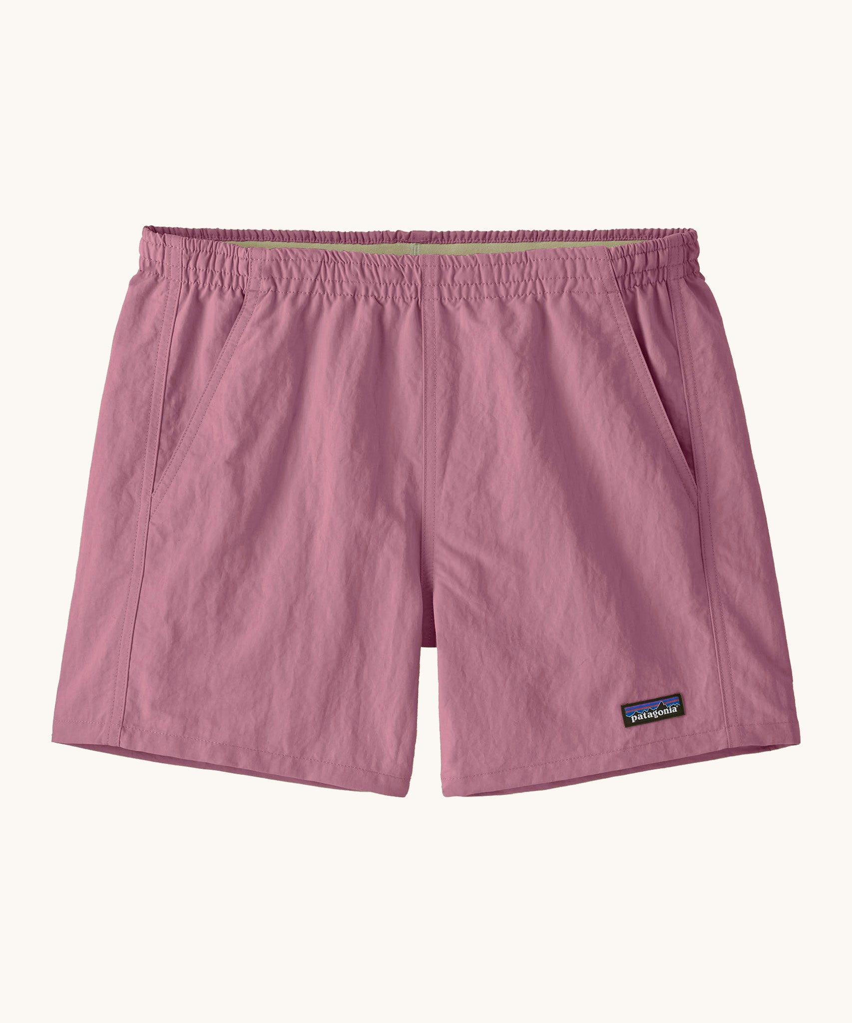 Patagonia quick drying women's baggies shorts in light purple. Shows 2 front pockets