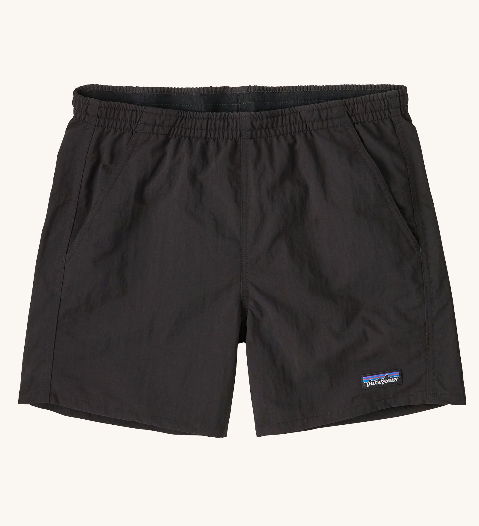 Patagonia quick drying women's baggies shorts in black. Shows 2 front pockets and elasticated waistband