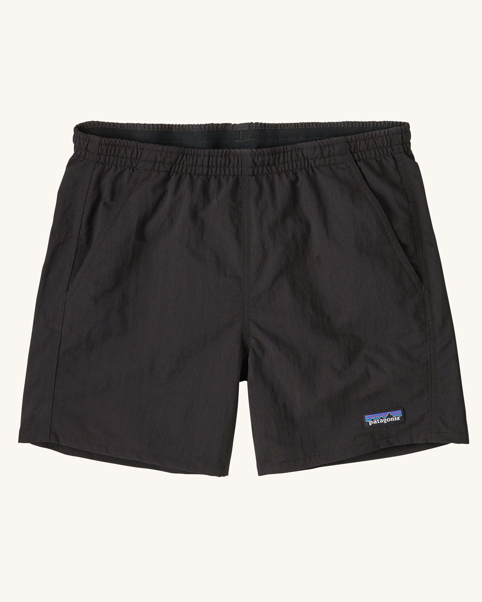 Patagonia quick drying women's baggies shorts in black. Shows 2 front pockets and elasticated waistband