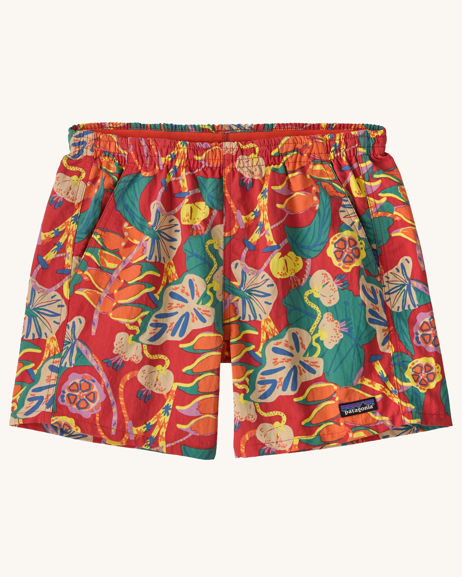 Patagonia quick drying women's baggies shorts in red with repeating abstract tropical pattern. Showing 2 front pockets