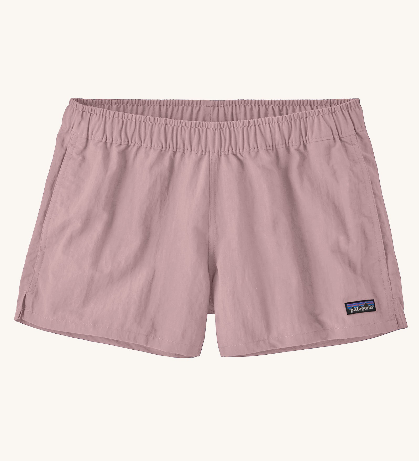 Patagonia quick drying women's barely baggies shorts in light pink. Shows 2 side pockets and elasticated waist band