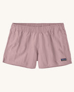 Patagonia quick drying women's barely baggies shorts in light pink. Shows 2 side pockets and elasticated waist band