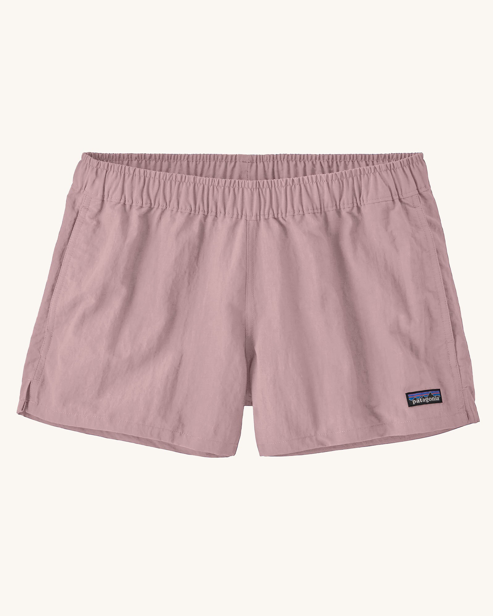 Patagonia quick drying women's barely baggies shorts in light pink. Shows 2 side pockets and elasticated waist band