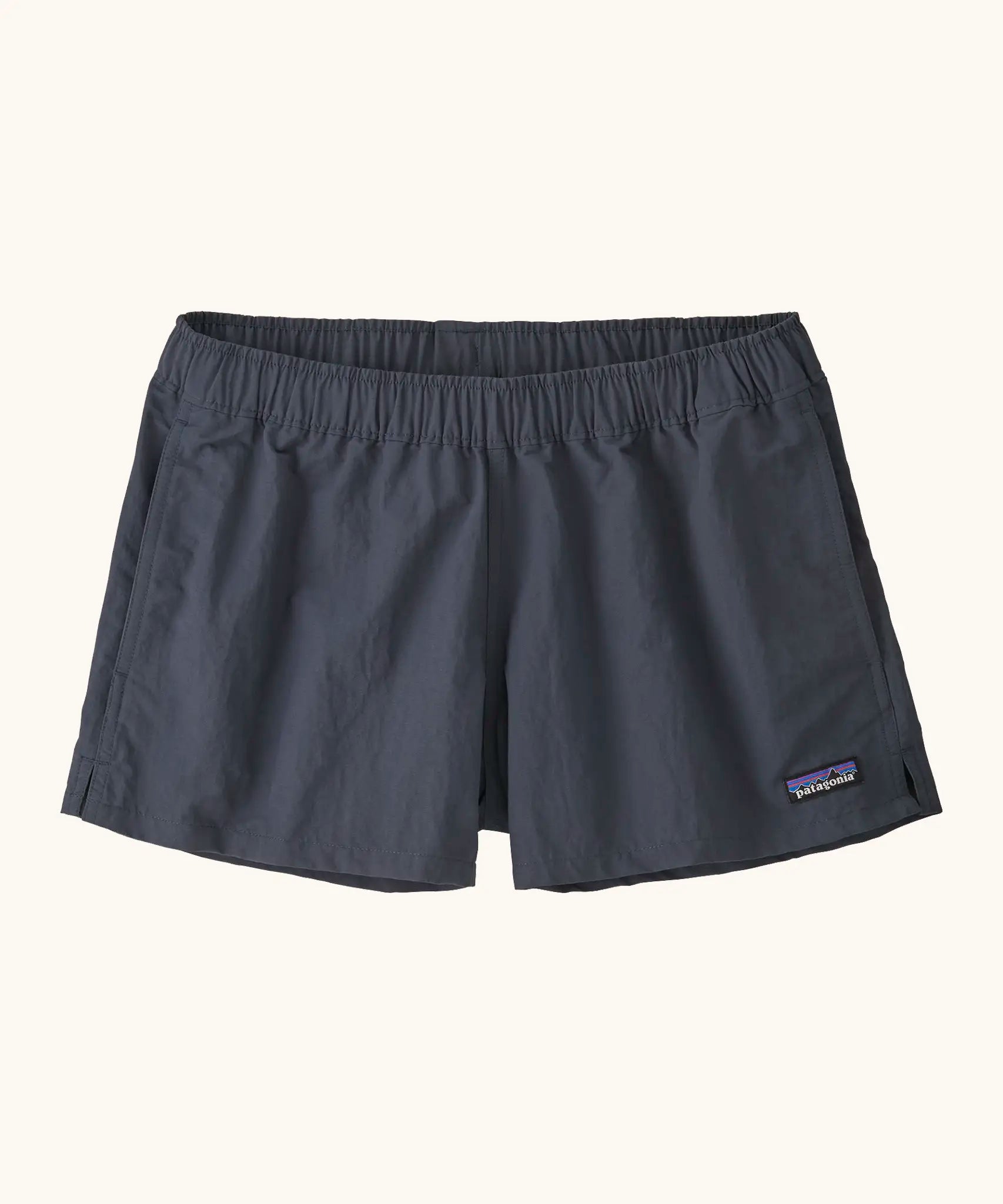 Patagonia quick drying women's barely baggies shorts in navy blue. Shows 2 side pockets and elasticated waist band