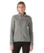 Woman wearing Patagonia's women's better sweater jacket in grey. Jacket has a regular fit and sits at the hips.