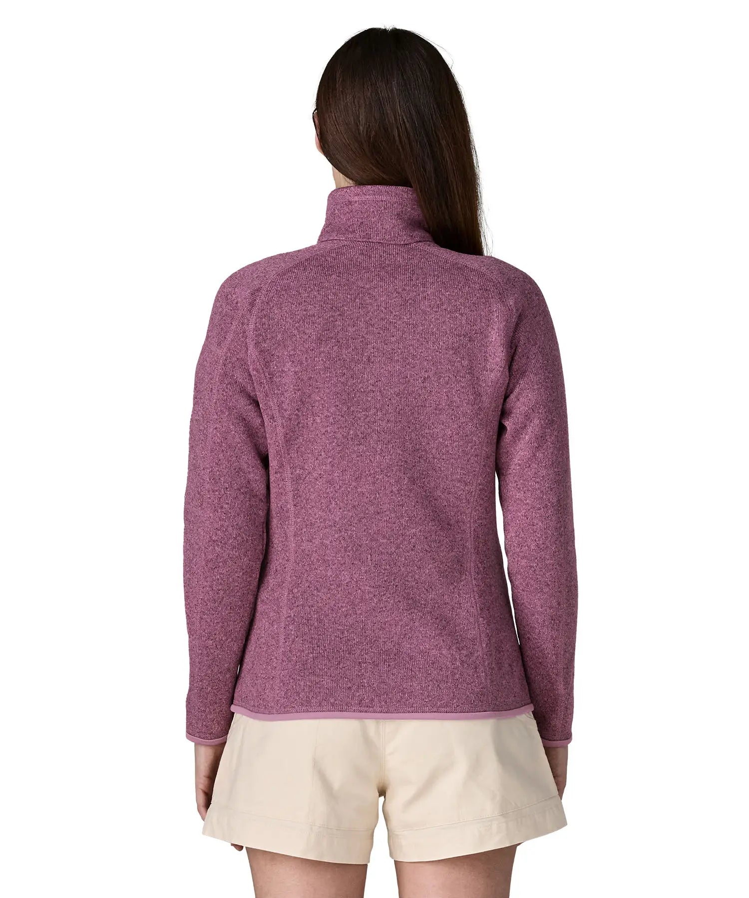 Back of woman wearing Patagonia's women's better sweater jacket in purple. The jacket has a regular fit 