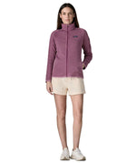 Back of woman wearing Patagonia's women's better sweater jacket in purple showing full length front zip. The jacket has a regular fit 
