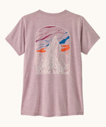 Patagonia women's capilene cool daily short sleeve t-shirt in pale purple with mountain graphic on the back